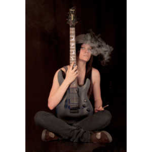 I saw an amazing picture on a web site of this female guitarist.  She was beautiful.  After a bit of searching, I was able to contact her and we did this shoot together.